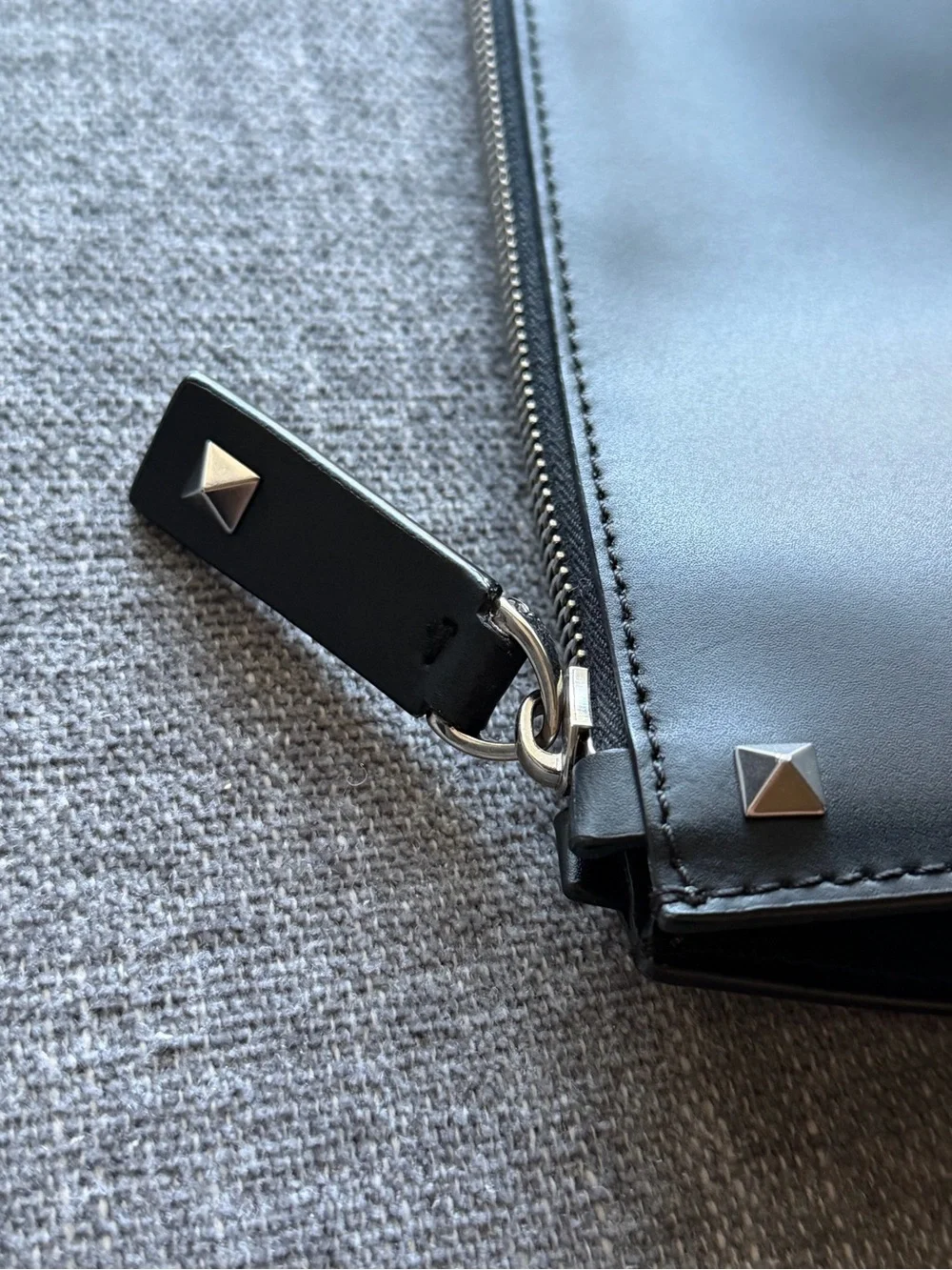 Valentino Garavani VLTN Black Leather Zip Pouch with Stud Accents